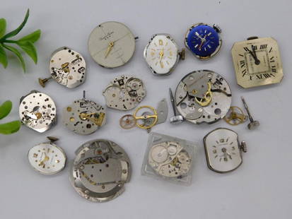 Vintage Watch Movements and Parts WATCHMAKER WATCHMAKING TOOLS: Collection of vintage watch movements and components, ideal for repair or craft projects. | Includes dials, gears, hands, and various mechanisms in a mix of conditions. | Notable variety with