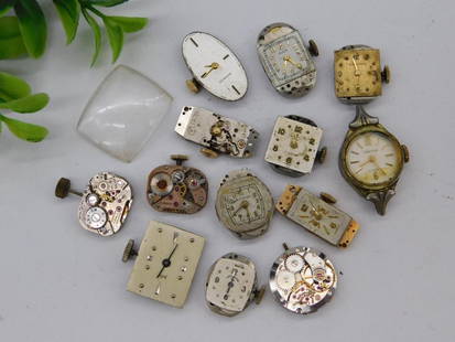 Vintage Wristwatch Movements and Parts WATCHMAKER WATCHMAKING TOOLS: Includes a collection of 12 vintage watch movements and parts, featuring various dials, hands, and gears. | A mix of mechanical components, some with visible jewels, balance wheels, and intricate