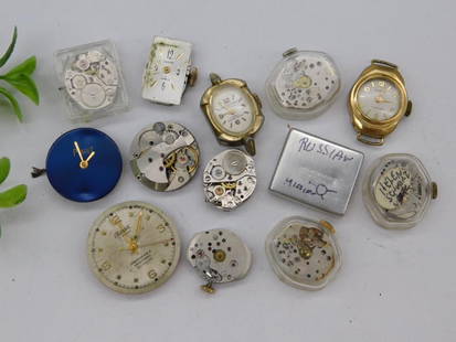 Vintage Watch Movements and Dials WATCHMAKER WATCHMAKING TOOLS: Collection includes various vintage watch movements, dials, and cases. | Brands include Piaget and other identifiable and non-identifiable pieces. | Contains both mechanical movements and watch parts