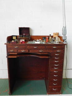 Custom Made Vintage Watchmakers Wooden Desk with Multiple Drawers WATCHMAKER WATCHMAKING TOOLS: DESK ONLY. TOOLS NOT INCLUDED. PICK UP ONLY OR BIDDER ARRANGES PICK UP. This desk was made specifically for a vice president at the Elgin pocket watch Company. It has not one but two nets or catch tra