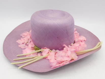 Saks Fifth Avenue Women?s Lavender Hat with Floral Decorations: - Lavender hat with a wide brim and floral accents | - Embellished with pink flowers and decorative stems around the base of the crown | - Label inside reads 'Saks Fifth Avenue' | - Made of lightweigh