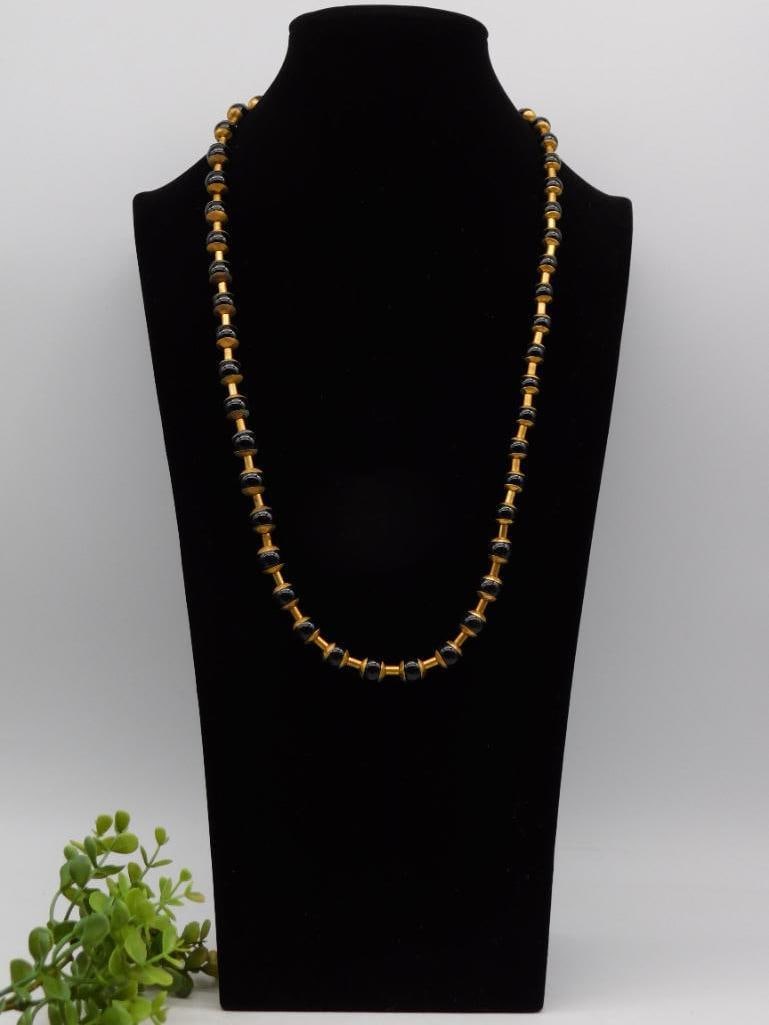 Gold-Toned Necklace With Blue Bead Accents: - Features a gold-toned metal finish on the chain and accents. | - Designed with blue bead details intertwined along the length of the necklace. | - Necklace appears to have a uniform design with alte