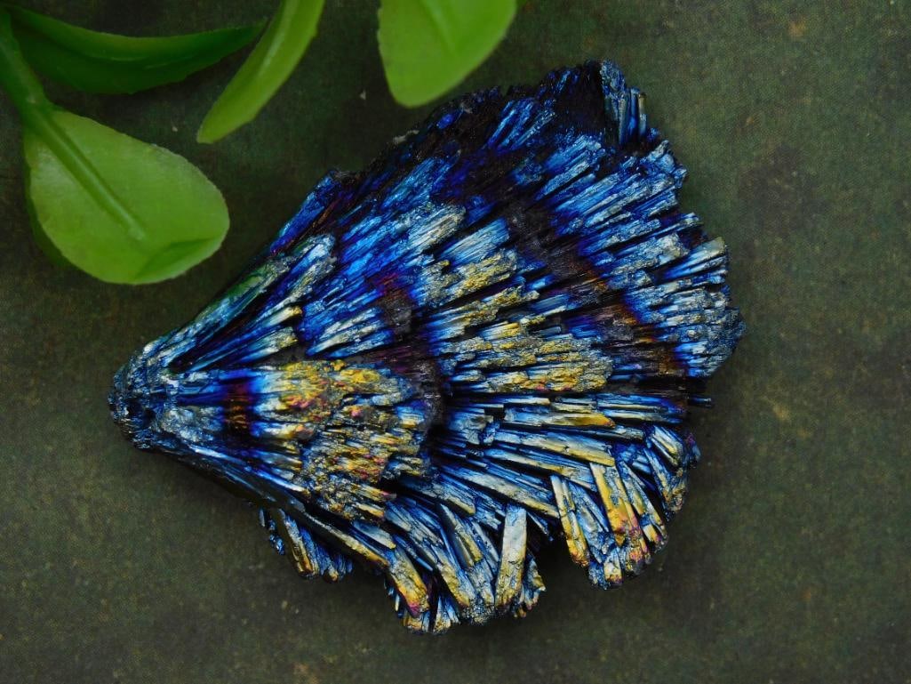 Rainbow Kyanite ROCK STONE LAPIDARY SPECIMEN: Rainbow Kyanite. Exhibits a stunning array of colors with blue, gold, and purple tones. | - Weighs approximately 12 grams, as marked on identification card. | - Suitable for collectors, mineral enthus