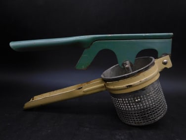 Vintage Metal Potato Ricer with Green and Yellow Handle