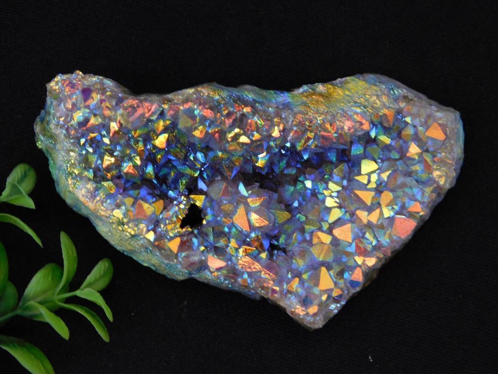 Angel Aura Amethyst Rock Stone Lapidary Specimen: - Iridescent quartz crystal cluster specimen with vibrant reflective hues. | - Includes triangular formations that shimmer in various colors, including blue, purple, and gold. | - Weighs 199 grams as