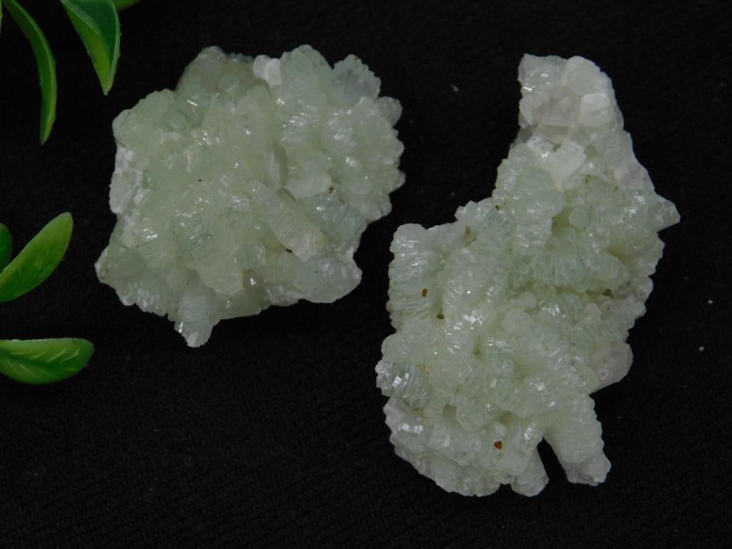 Two Phrenite Green Mineral Specimens from Lot 707786: Set of two pale green mineral specimens from Lot 707786. Display crystalline formations and appear naturally formed. Weight is noted as 34 grams. Ideal for collectors or geological enthusiasts. Quarte