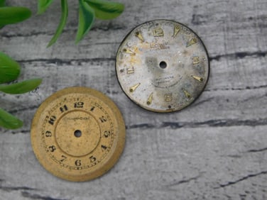 Two Vintage Watch Faces With Gold and Numbered Details