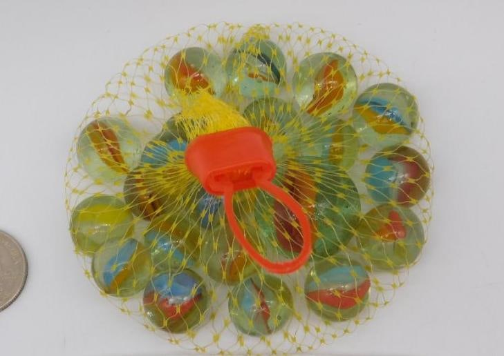 Bag of Decorative Glass Marbles in Netting: The lot features a bag of decorative glass marbles contained in yellow netting with a red plastic pull tab for closure. Includes multicolored marbles with swirling designs. Coin shown for scale is not
