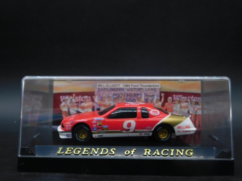 Legends of Racing Bill Elliott Die-Cast Car: Legends of Racing die-cast car featuring Bill Elliott's #9 race car. Includes a detailed backdrop highlighting Bill Elliott's historic racing accomplishments. Comes in original display case with a lim