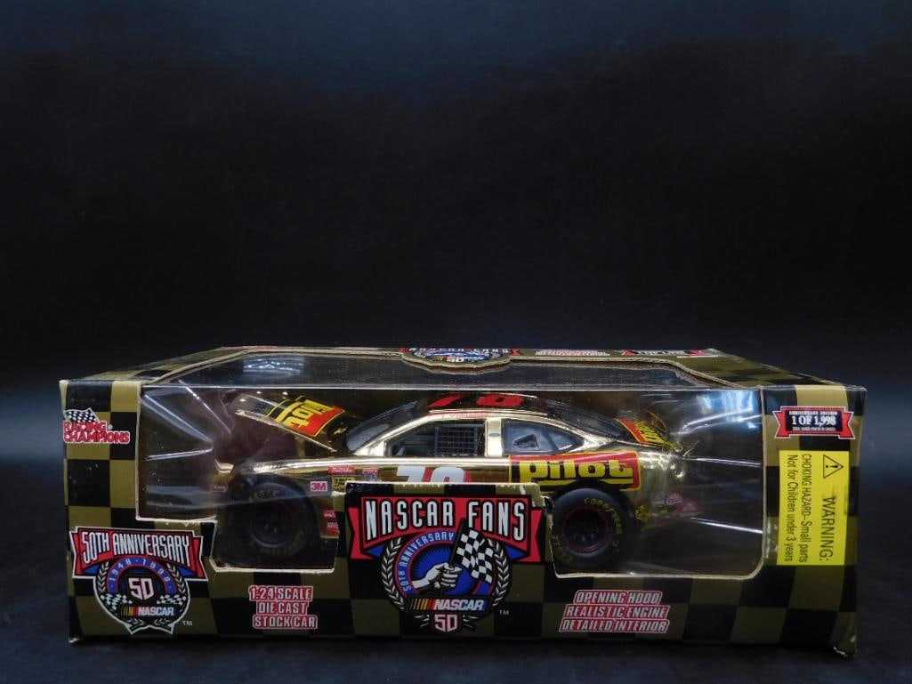 NASCAR 50th Anniversary Pilot Car No. 78 Diecast Model: NASCAR Fans 50th Anniversary Pilot Car No. 78 diecast model car in its original packaging. Manufactured by Racing Champions, this collectible features detailed decals and branding. The box has moderat
