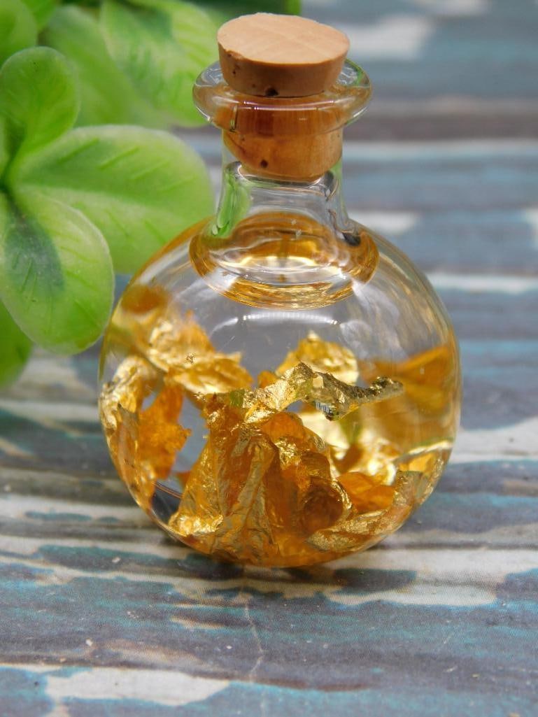 GOLD FLAKES IN BOTTLE ROCK STONE LAPIDARY SPECIMEN: GOLD FLAKES IN BOTTLE ROCK STONE LAPIDARY SPECIMEN