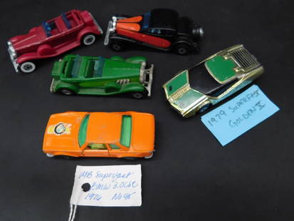 Lot of 5 Hot Wheels and Matchbox Die-Cast Cars: Lot contains five die-cast toy cars. Brands include Hot Wheels and Matchbox, featuring a combination of vintage and unique models. Cars feature a mix of designs, including a sporty SUV, a luxury sedan