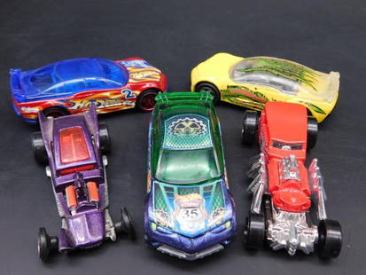 Set of 5 Hot Wheels Cars by Mattel, Various Designs: This lot includes a set of 5 Hot Wheels cars manufactured by Mattel. Details include: a variety of colors and designs, stamped with manufacturing details from Thailand and Malaysia, production dates r