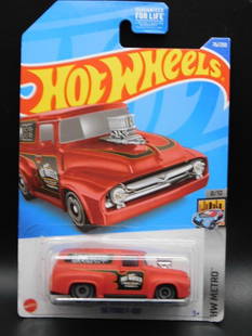 Hot Wheels 56 Ford F-100 HW Metro Series: Hot Wheels '56 Ford F-100 die-cast vehicle from the HW Metro Series, numbered 8/10. This model includes detailed graphics and is mounted in its unopened original packaging. The packaging displays ligh