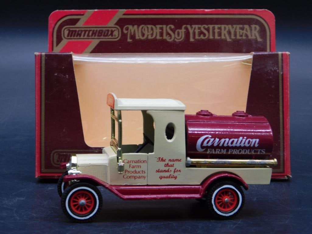 Matchbox Models of Yesteryear Carnation Tanker: Matchbox Models of Yesteryear collectible Carnation Tanker. Includes original packaging, though the clear plastic window is partially distorted, and the box shows signs of wear. The detailed Carnation