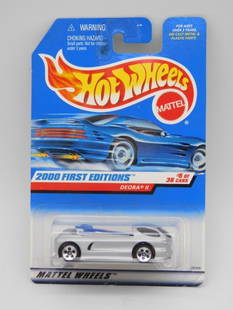 Hot Wheels 2000 First Editions Deora II #5 of 36: Hot Wheels 2000 First Editions Deora II, #5 out of 36 models in the series. Features include a silver finish, detailed wheels, and original packaging. Card shows illustrations and details on the back.