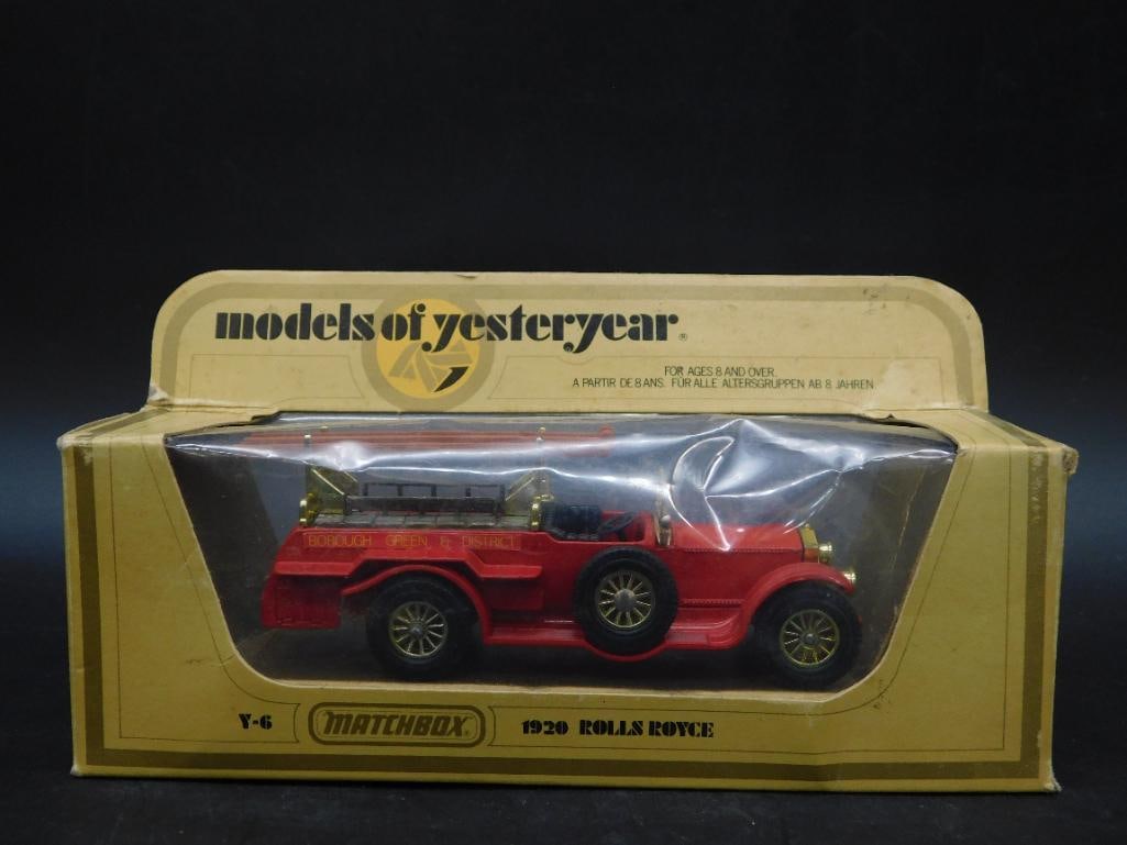 Matchbox Models of Yesteryear 1920 Rolls-Royce: Matchbox Models of Yesteryear diecast model of a 1920 Rolls-Royce. Features detailed construction in red with gold accents and black details. Packaged in original box with clear plastic display window
