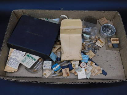Watch Parts and Hands in Box WATCHMAKER WATCHMAKING TOOLS: - Lot includes a mixture of vintage watch parts and hands. | - Contains a Swartchild & Co. fine hands assortment box with vials organized by hand types. | - Assortment includes items such as small wat