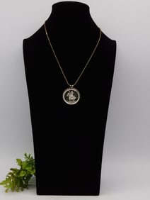 Silver Pendant Necklace With Detailed Depiction
