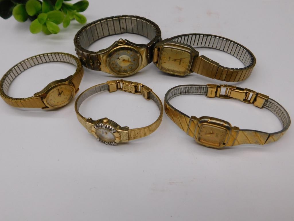 5 Vintage Womens Gold-Tone Watches Watchmaker Watchmaking Tools: - Includes 5 gold-tone women's wristwatches: brands feature Pulsar, Waltham, Timex, and others. | - Various case shapes including round and rectangular, with stretchable or adjustable bracelets. | - Q