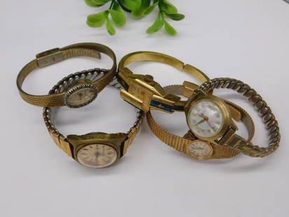 Five Vintage Womens Wristwatches Watchmaker Watchmaking Tools: - Lot of five vintage women's wristwatches with assorted styles and designs. | - Brands present include Arnex, Benrus, Gruen, and others. | - Various gold-tone finishes and bracelet styles are include