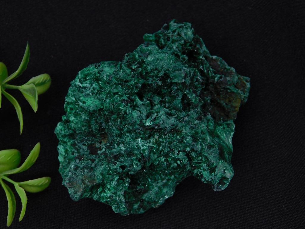 Large Malachite Mineral Specimen for Collection Rock Stone Lapidary Specimen: This listing features a striking green malachite mineral specimen. It has an irregular and textured surface, exhibiting the characteristic deep green and layered tones of malachite. The specimen is su