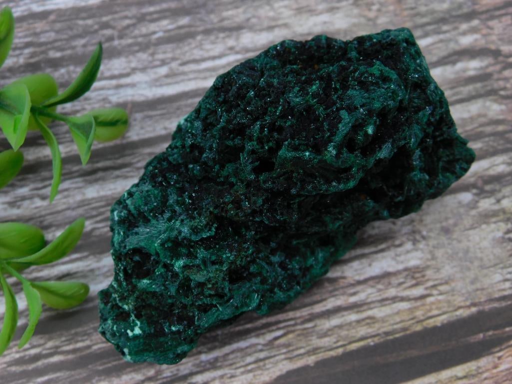 Malachite Rock Stone Lapidary Specimen Weighing 154 Grams: Natural malachite mineral specimen showcasing vibrant green hues and intricate texture. Weighs 154 grams, as noted in the listing card. Ideal for collectors or geology enthusiasts. Coin is shown for s