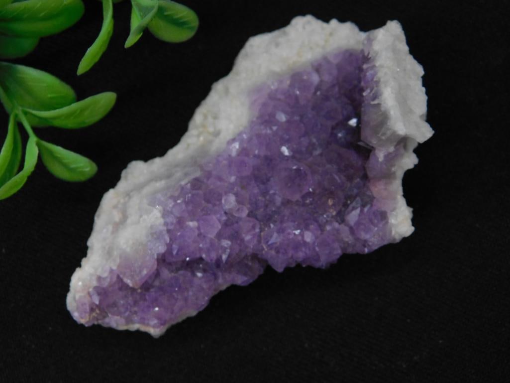 Amethyst Geode Cluster With White Crystalline Edges Rock Stone Lapidary Specimen: This listing features a stunning amethyst geode cluster with vivid purple crystals in the center and white crystalline edges. The cluster weighs 46 grams and showcases natural textures and formations.