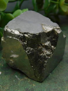 Natural Pyrite Mineral Specimen with Metallic Sheen ROCK STONE LAPIDARY SPECIMEN: Natural pyrite mineral specimen displaying a metallic gold-toned sheen. | Approximate weight of 150 grams as labeled. | Includes size reference shown with a coin for scale. | Lot number 710241 as seen