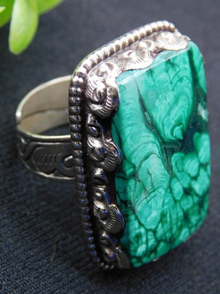 Adjustable Malachite Ring Size 10 ROCK STONE LAPIDARY SPECIMEN: Vintage silver ring featuring a rectangular green stone with natural patterns. | The band and surrounding edge showcase distinctive engraved details. | Ring size: 10. | Stone composition and exact typ