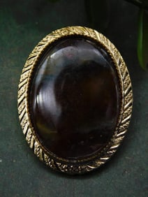 Vintage Gold-Tone Oval Brooch with Dark Stone