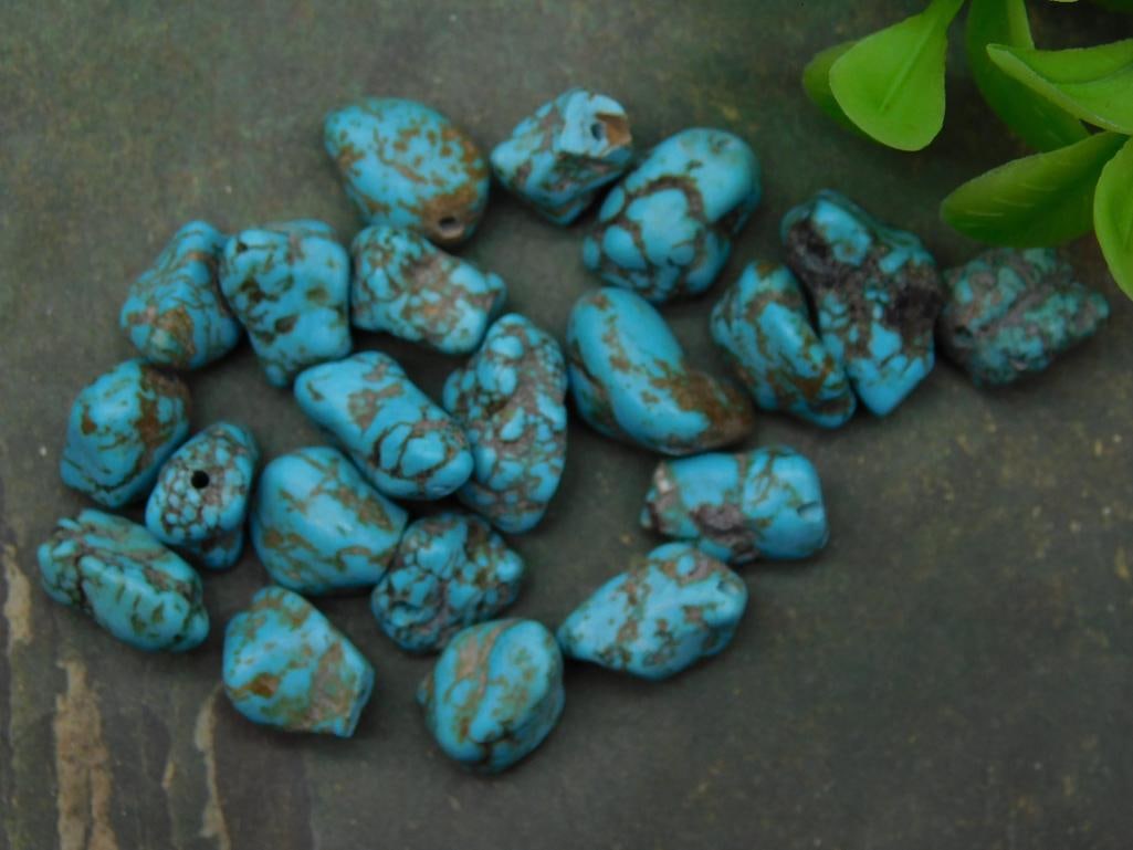 Stone Nugget Beads for Jewelry Making ROCK STONE LAPIDARY SPECIMEN: Includes multiple pieces of natural turquoise nuggets. | Vibrant blue hues with natural matrix and irregular shapes. | Ideal for jewelry crafting or gemstone collection. | Comes as pictured with a nea