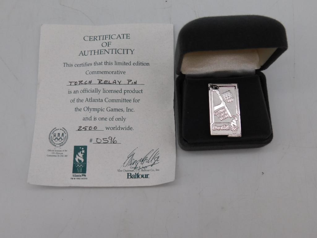 1996 Atlanta Olympic Torch Relay Commemorative Pin: Limited edition 1996 Atlanta Olympic Torch Relay pin. | Comes with a Certificate of Authenticity indicating official licensing from the Atlanta Committee for the Olympic Games, Inc. | Numbered 0596 ou
