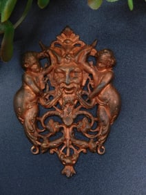 Cast Metal Decorative Accent with Mythical Motif