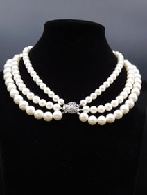 Triple-Strand Pearl Necklace with Decorative Clasp