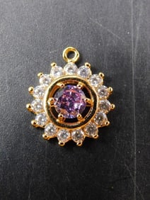 Gold-Tone Pendant With Purple and Clear Stones