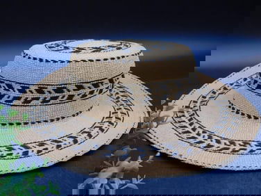 Handwoven Straw Hat with Black Geometric Patterns