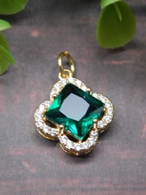 Gold-Tone Pendant With Green Stone and Clear Accents