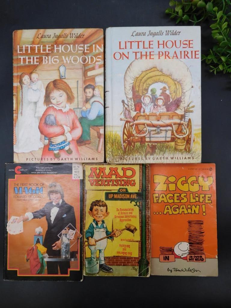 Vintage Books: Little House Series and Humorous Titles: Includes two titles by Laura Ingalls Wilder: 'Little House in the Big Woods' and 'Little House on the Prairie,' featuring illustrations by Garth Williams. | One 1972 first printing of 'Mad Vertising'