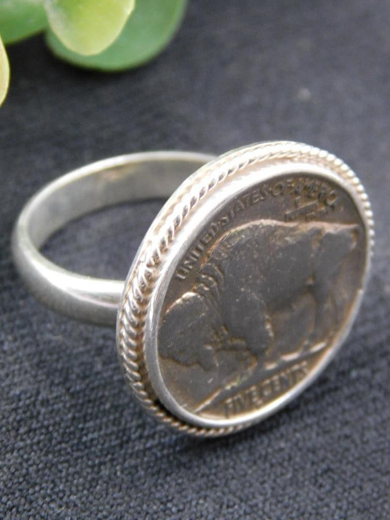 Buffalo Nickel Sterling Silver Ring, Size 9.5: Features a real buffalo nickel coin set into a sterling silver ring. | Buffalo nickel displays the iconic American bison design. | Marked inside the band with '925' and 'Dali,' indicating sterling sil
