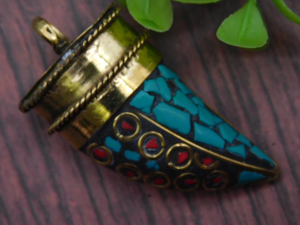 Turquoise And Brass Mosaic Pendant With Red Accents: Pendant features a mosaic pattern with turquoise-colored stone inlaid on a brass base. | Red circular accent stones are embedded alongside the turquoise pattern. | Cone-shaped design with a brass cap