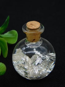 Silver Flakes in Bottle Rock Stone Lapidary Specimen