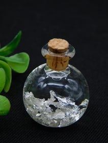 Silver Flakes in Bottle Rock Stone Lapidary Specimen