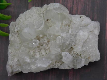 Specimen of Clear Quartz on White Matrix with Minerals ROCK STONE LAPIDARY SPECIMEN: - Clear quartz crystals on a white matrix. | - Contains greenish mineralization on the underside. | - Natural formation with visible crystal structures. | - Measurements provided alongside ruler for s