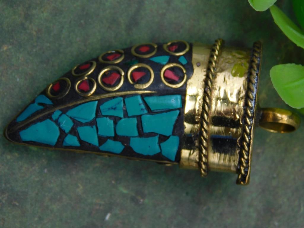 Mosaic Inlay Pendant With Brass Accents ROCK STONE LAPIDARY SPECIMEN: Unique pendant featuring a mosaic design with turquoise-colored inlays and brass accents. | Decorated with circular red mosaic elements set against a black backdrop. | Equipped with a loop for easily