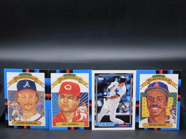 Four Baseball Cards Featuring Players from Major League Teams