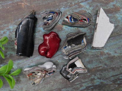 Fordite Motor City Agate Rock Stone Lapidary Specimen: Lot of assorted automotive paint rock fragments, also referred to as motor agate or fordite. Includes eight pieces showcasing layered paint with various colors and designs. Comes with a red centerpiec