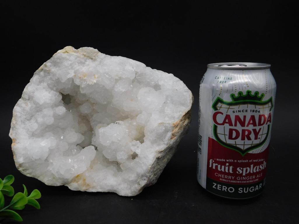 White Crystal Geode Specimen ROCK STONE LAPIDARY SPECIMEN: White crystal geode specimen featuring clustered formations. Includes a ruler and soda can for scale reference. Weighs 5 lbs 6.1 oz.