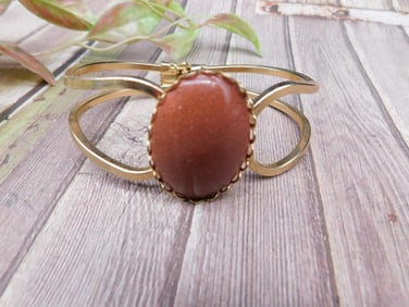 Gold-Tone Bracelet with Goldstone Centerpiece
