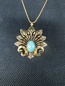 Gold-Tone Necklace with Turquoise-Colored Stone Pendant